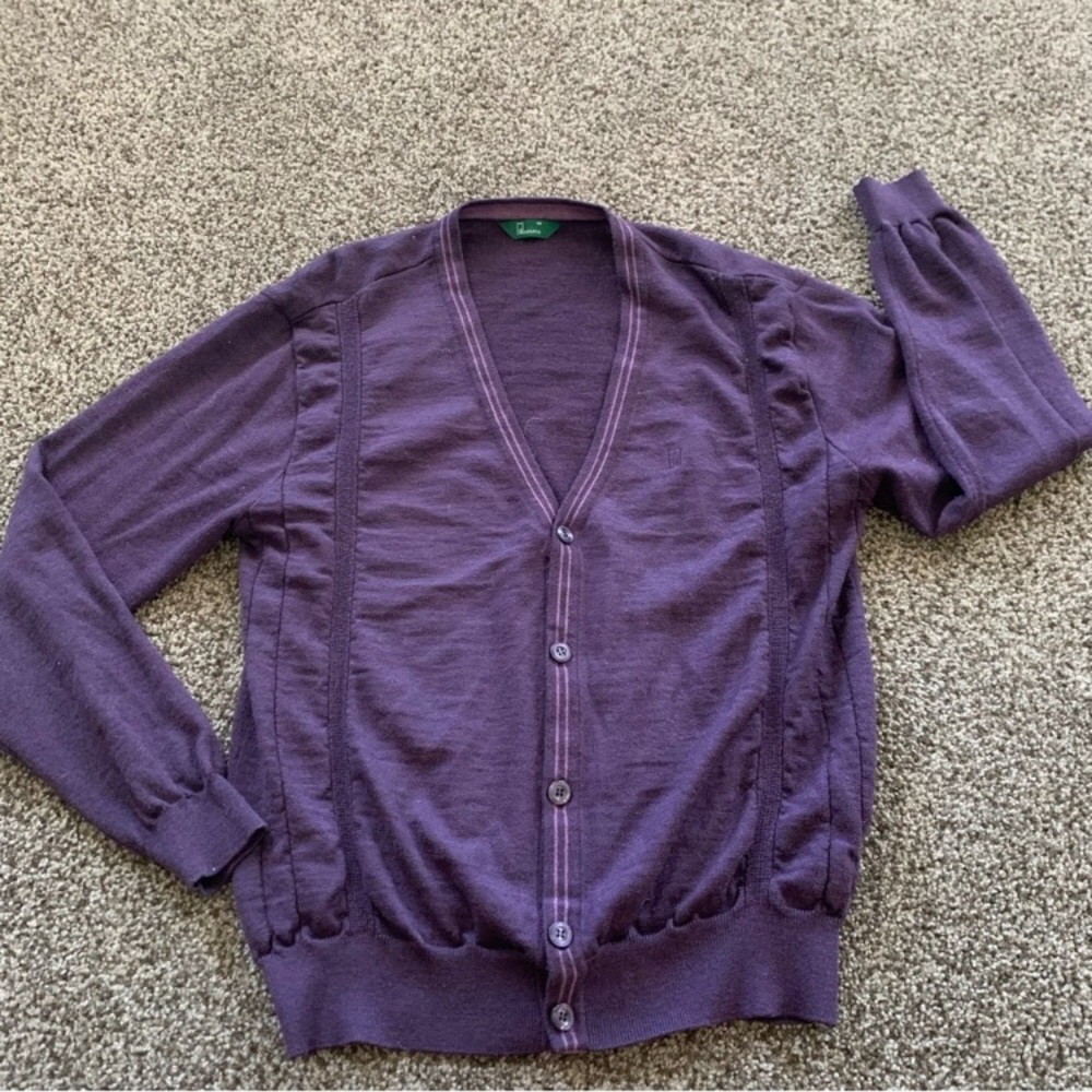 100% merino wool Cardigan button up sweater.
